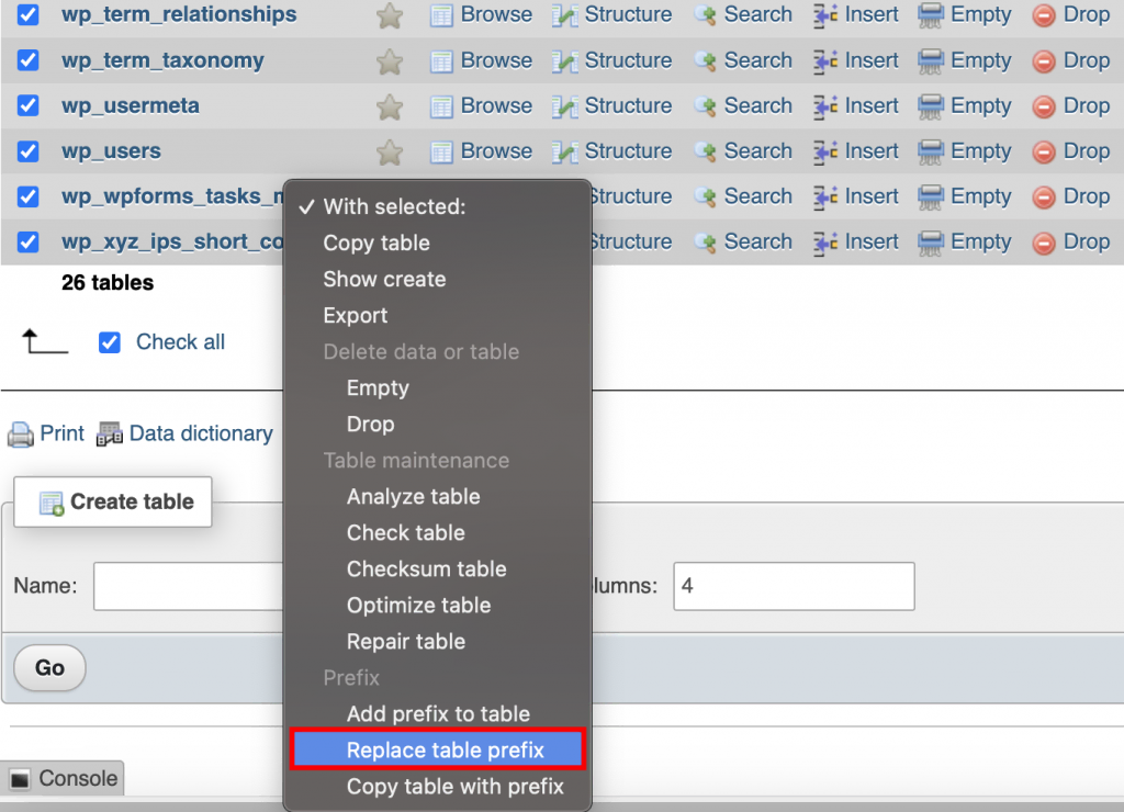 Klik op het keuzemenu Met geselecteerd en kies de optie Tabel prefix vervangen.
